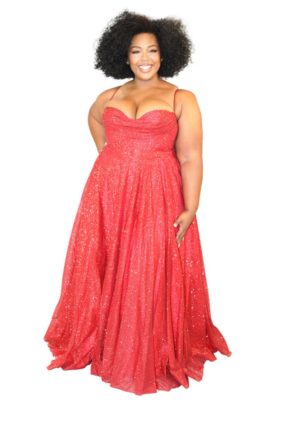 Woman wearing a red evening gown against a white background