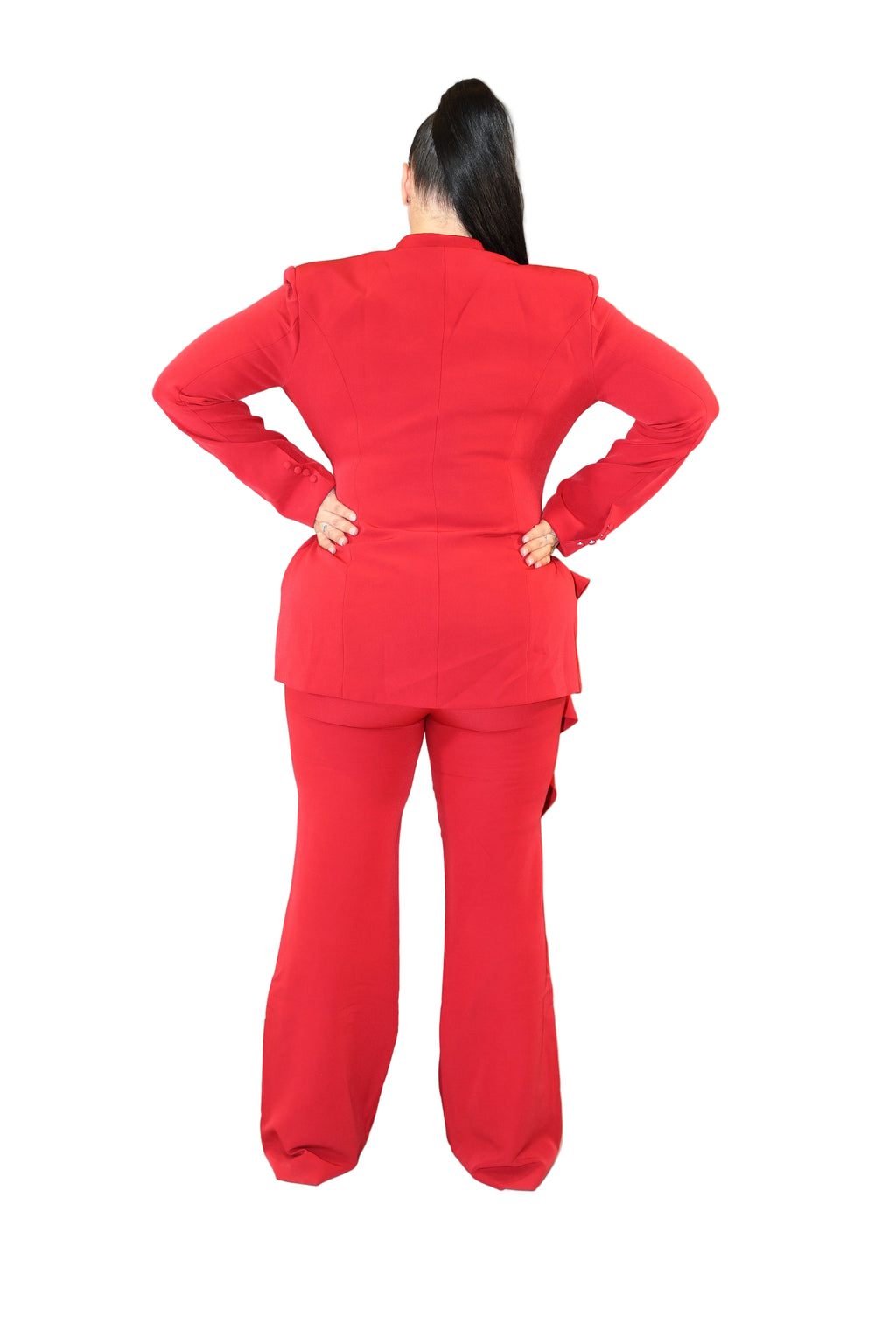 Person wearing a red outfit with a plain background