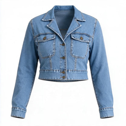 A cropped light blue denim jacket with a pointed collar, button front, and two chest flap pockets, shown on a plain white background.