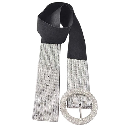 Black belt with a silver rhinestone buckle on a white background