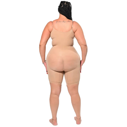 Woman wearing a beige shapewear bodysuit on a white background (back)