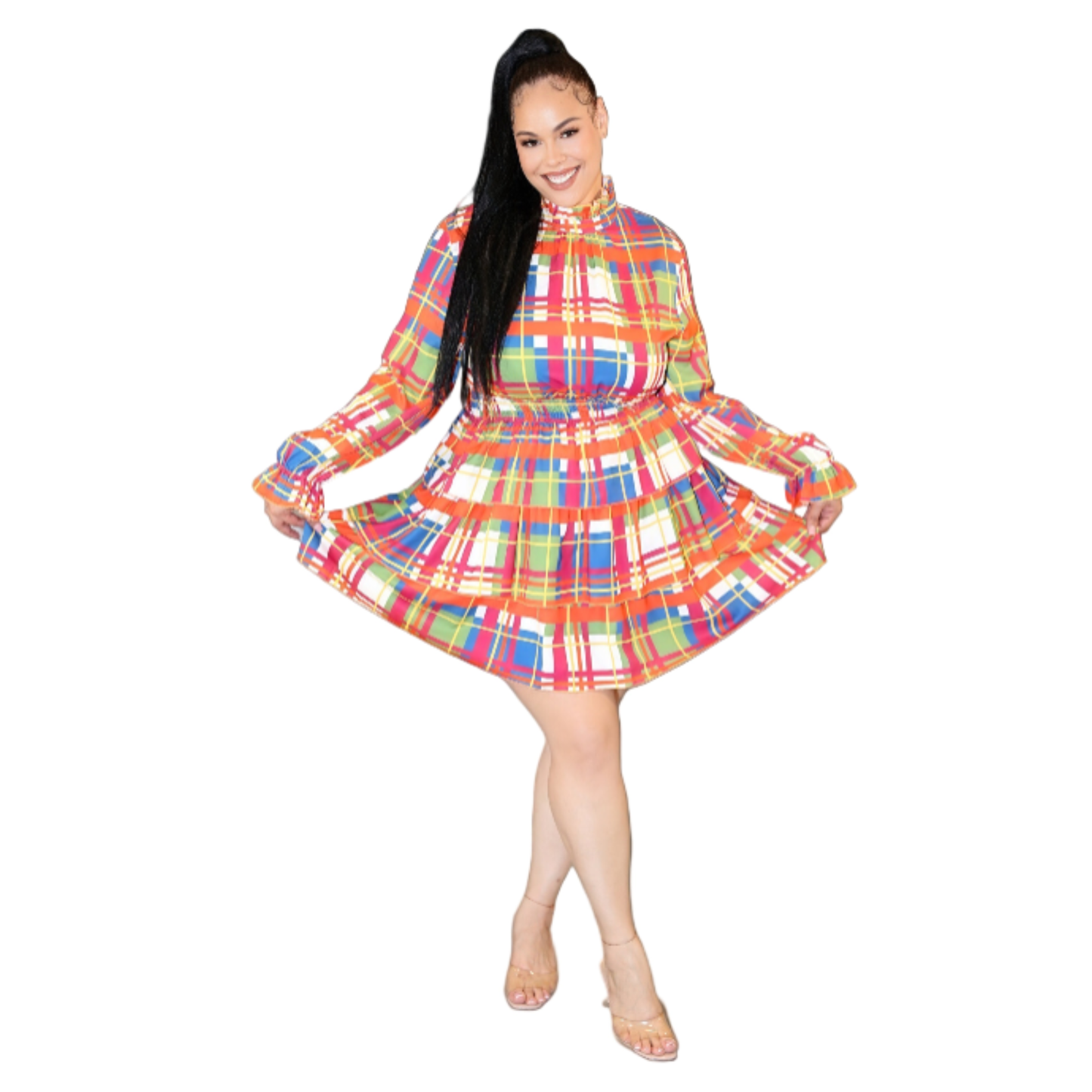 Woman wearing a colorful plaid dress on a white background