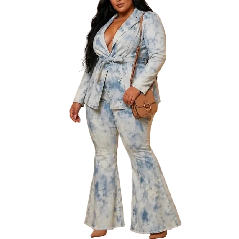 Woman wearing a denim tie-dye suit with a white background (side)