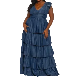 Woman wearing a blue tiered dress on a white background (front)