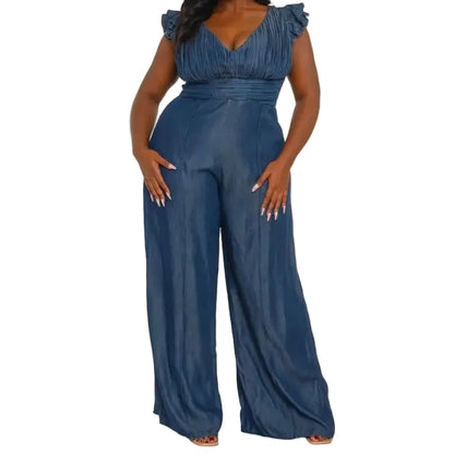 Woman wearing a denim jumpsuit on a white background. (front)