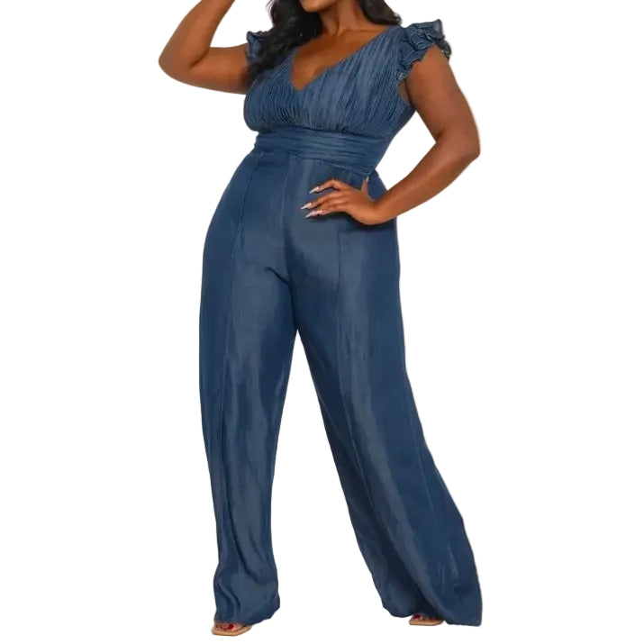 Woman wearing a denim jumpsuit on a white background. (front)
