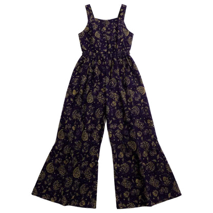 Mushroom patterned overalls on a white background