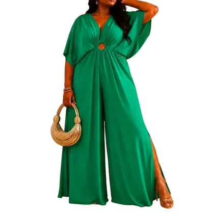 Woman wearing a green jumpsuit with a white background