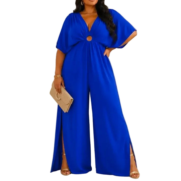Woman wearing a blue jumpsuit with a white background