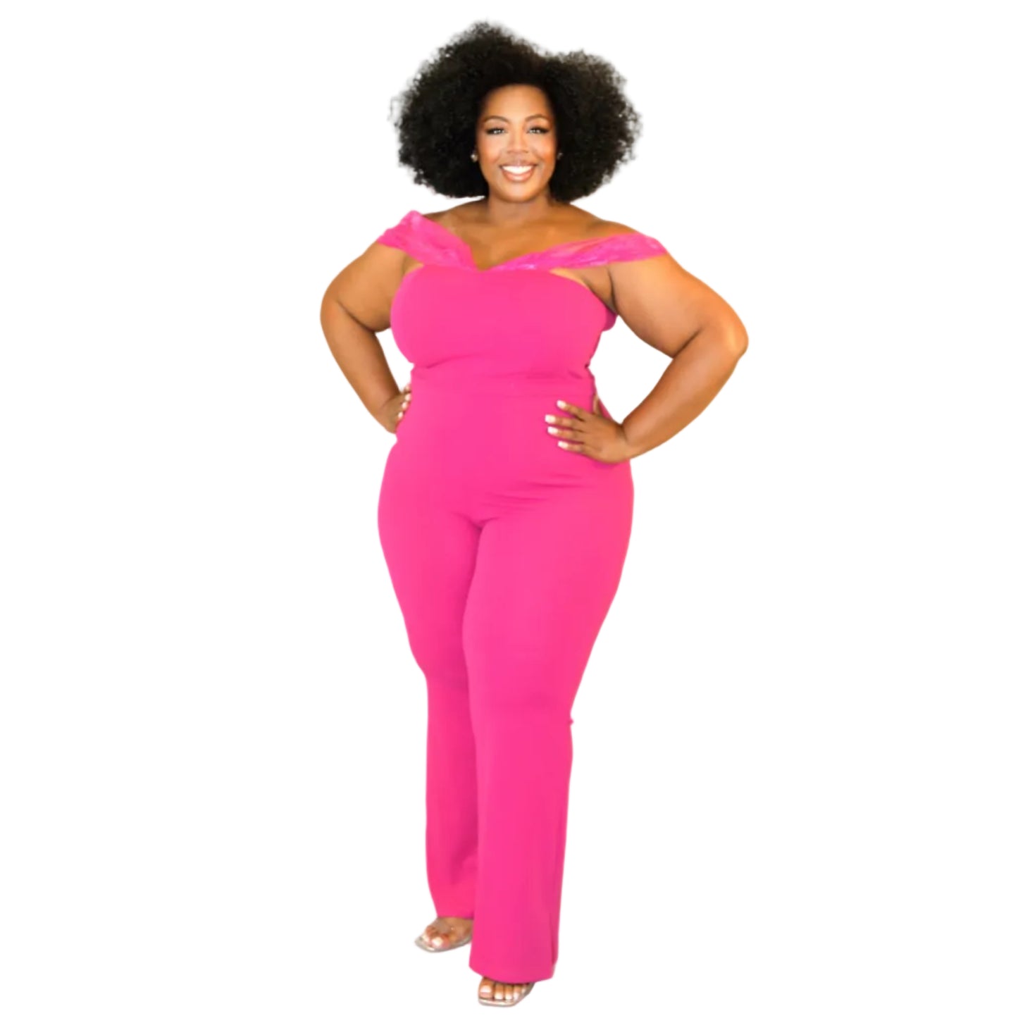 Woman wearing a bright pink jumpsuit with sheer off-the-shoulder sleeves on a white background. (front)
