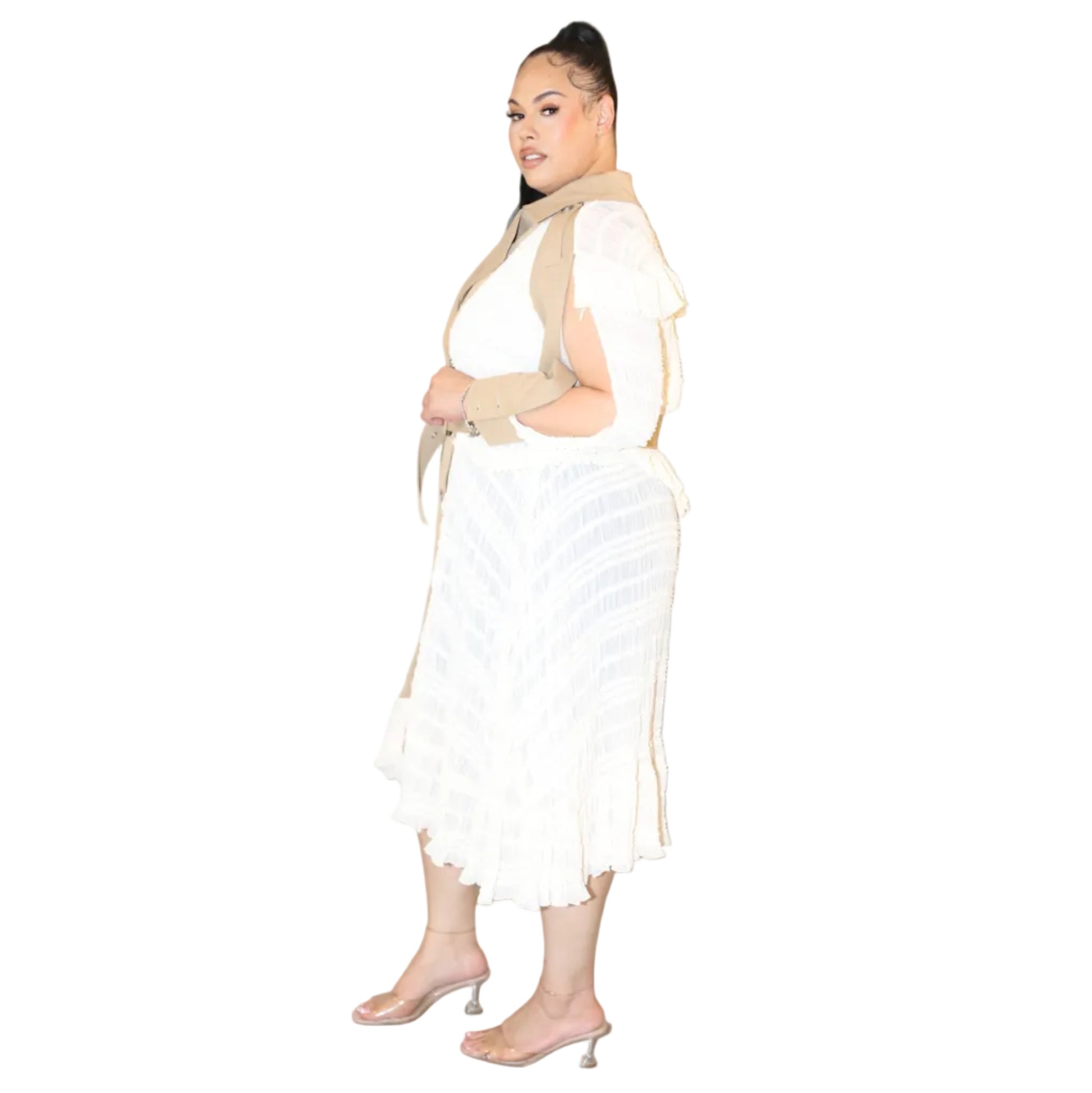 Woman wearing a white and khaki trench coat dress on a white background (left side)