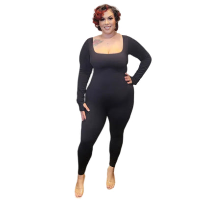 Woman wearing a long-sleeve catsuit on a white background.