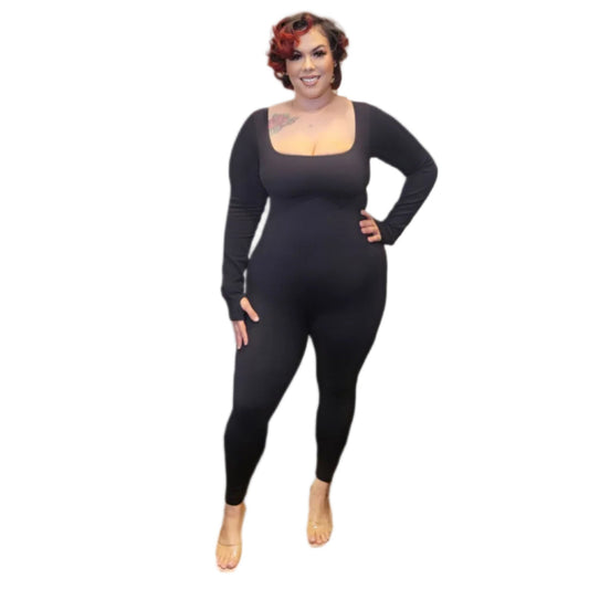 Woman wearing a long-sleeve catsuit on a white background.