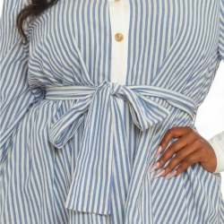 Blue and white striped dress with a tie waist worn by a person.