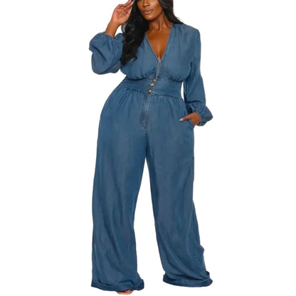 Woman wearing a blue denim jumpsuit on a white background