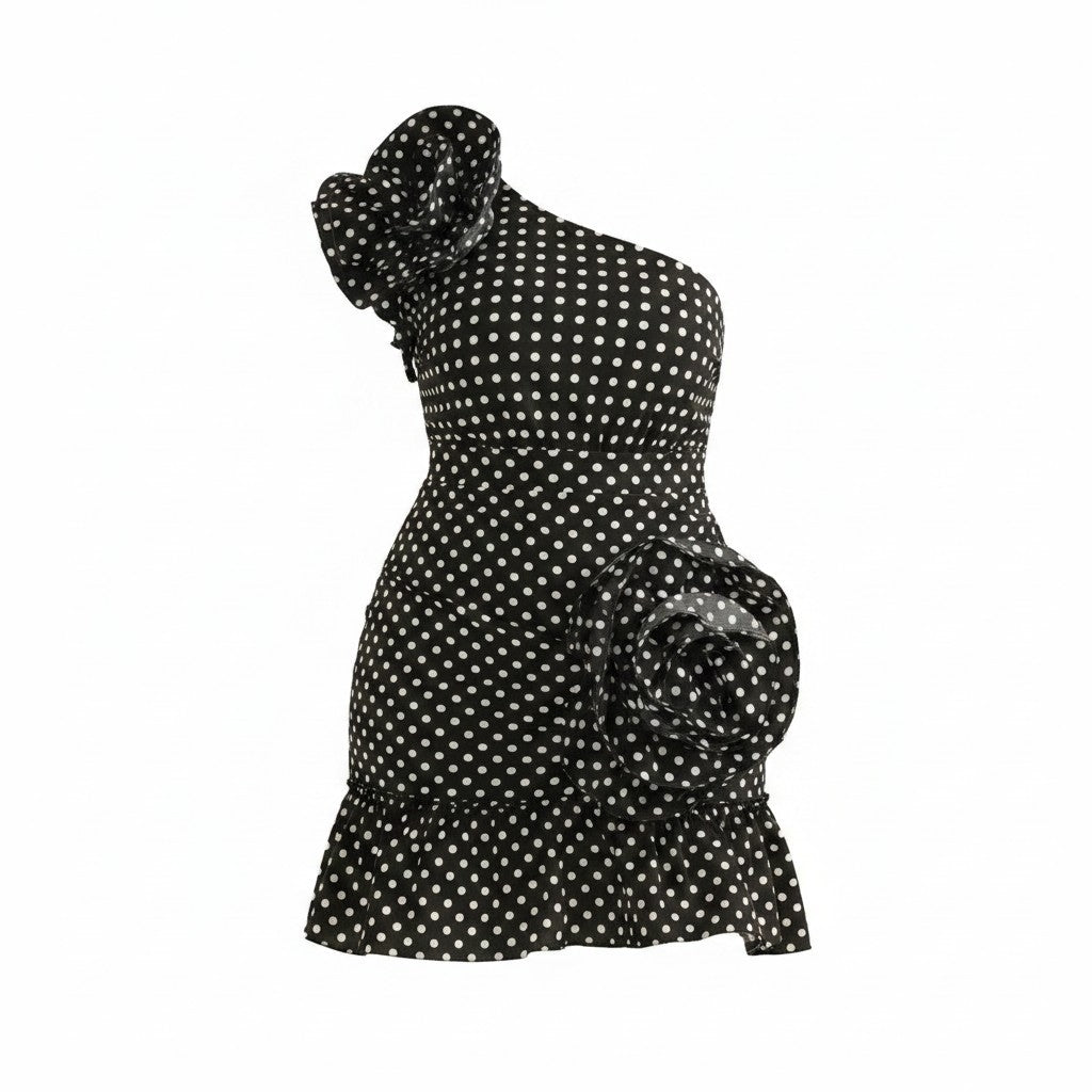Black polka dot dress on a white background