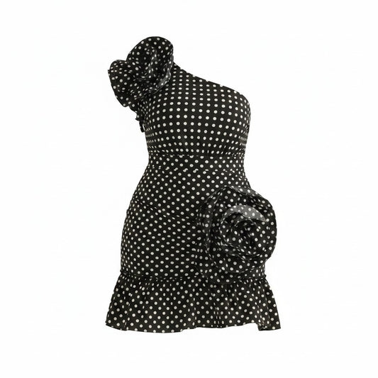 Black polka dot dress on a white background